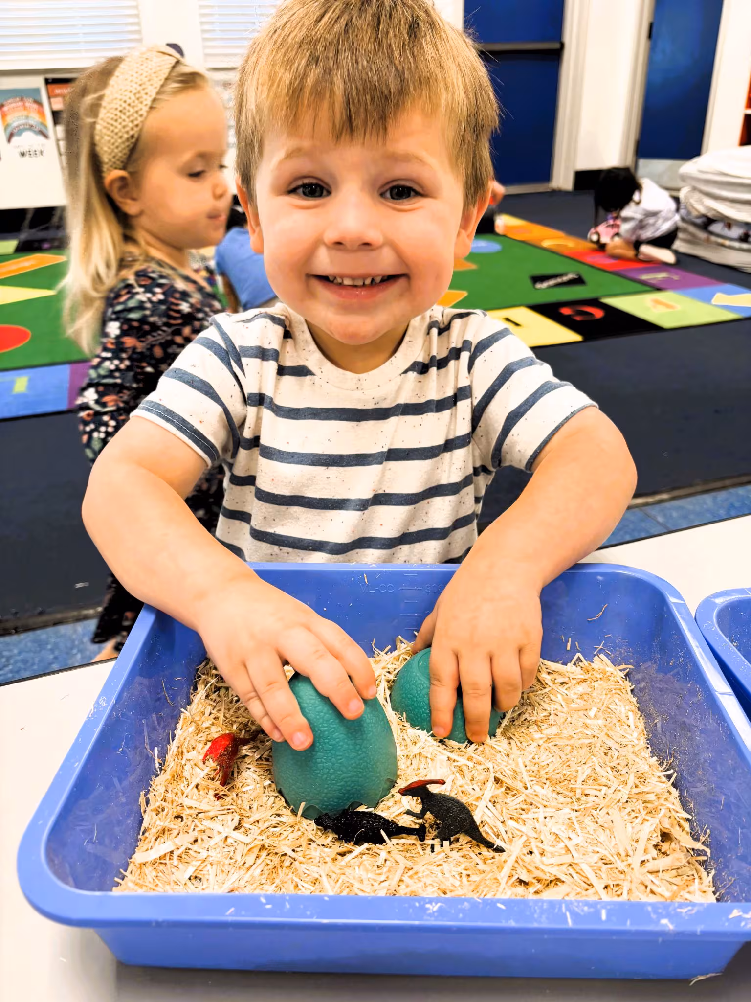 A young child exploring and discovering at Building Blocks Preschool